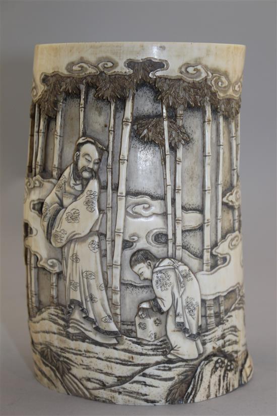 A Japanese ivory brush pot, late 19th century, 16cm, old repairs to base and base panel lacking